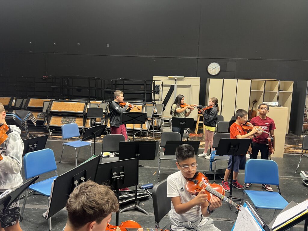 Station Orchestra Class practicing together