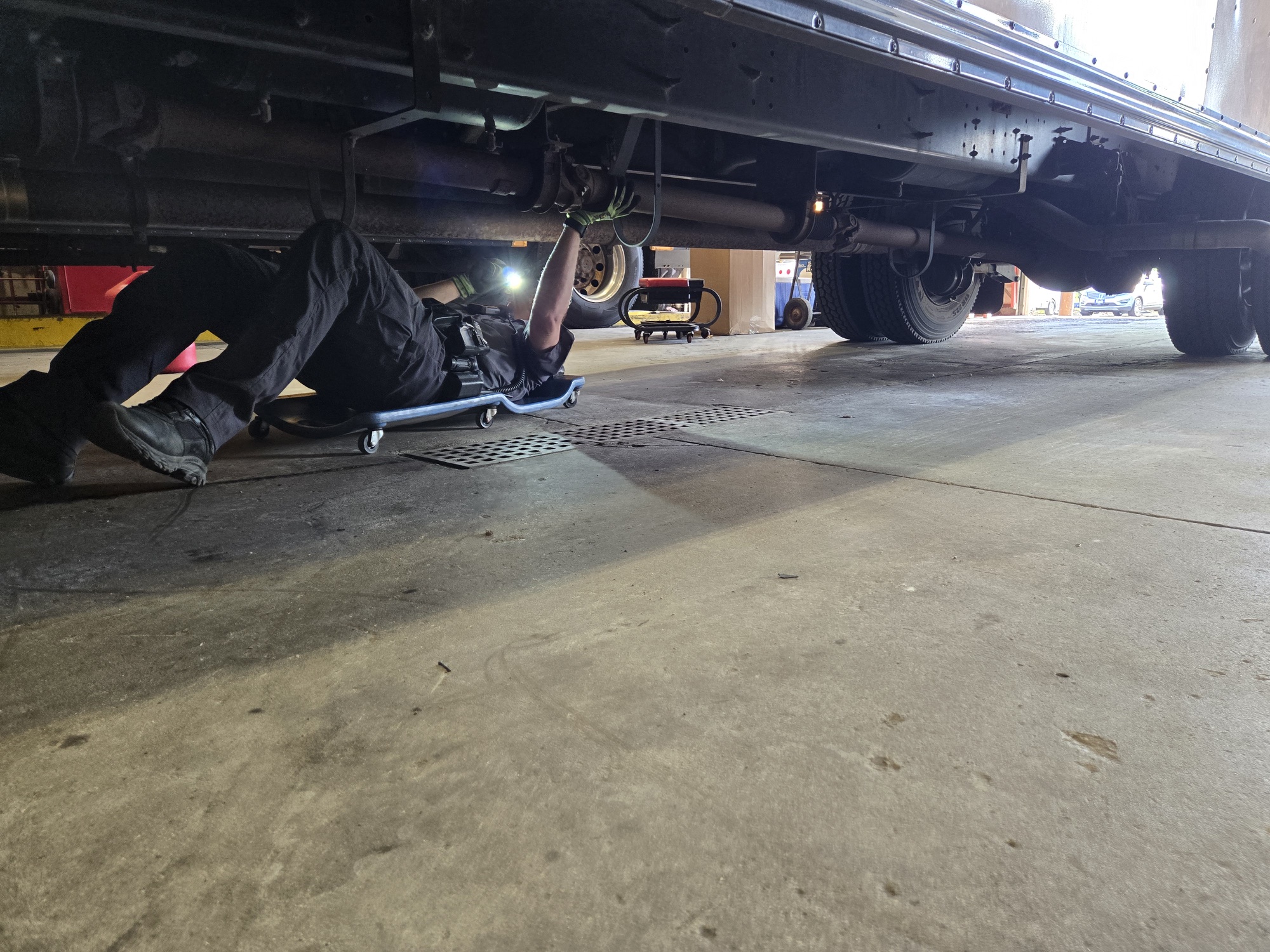 Man fixing school bus