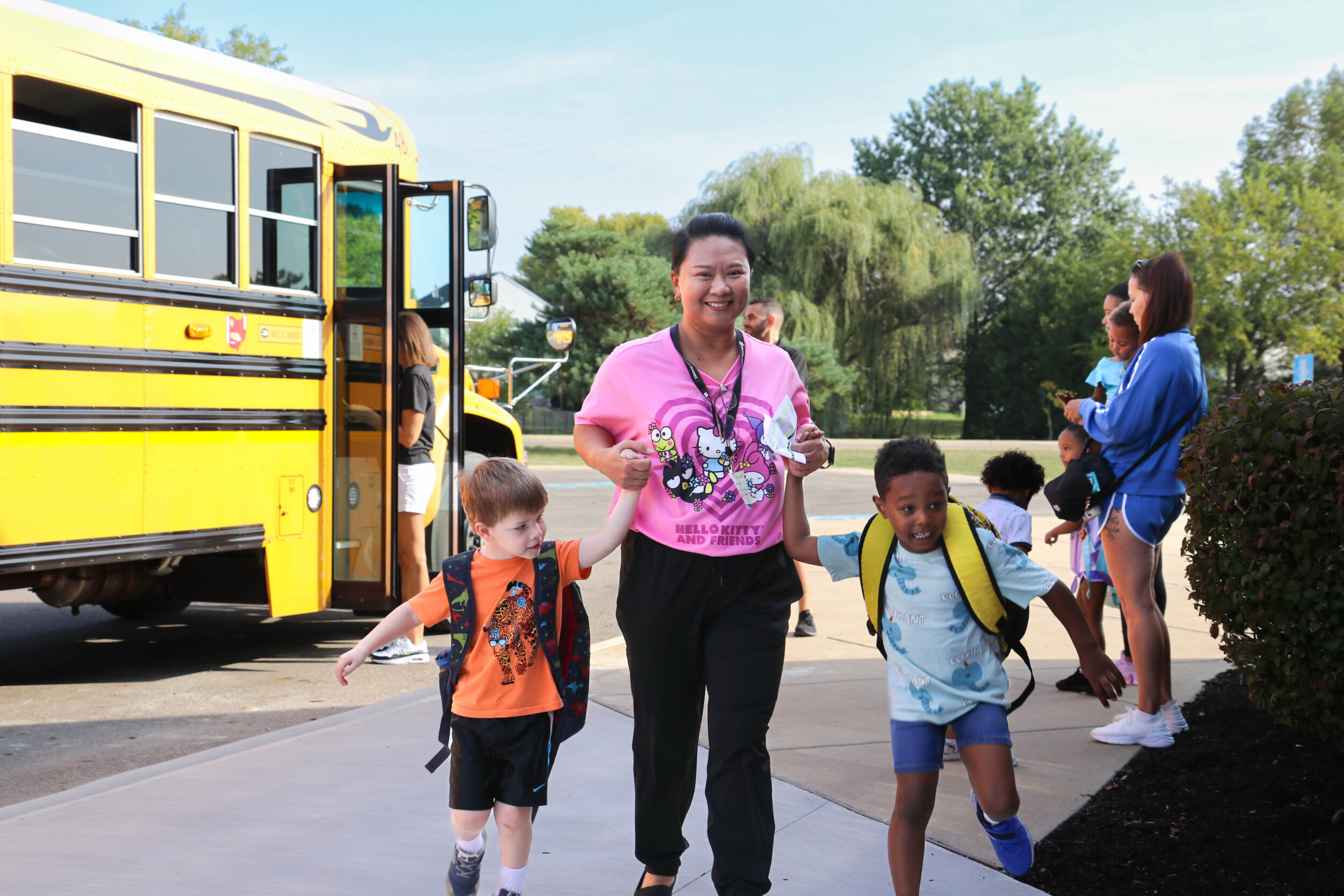 Teacher walking to school from bus