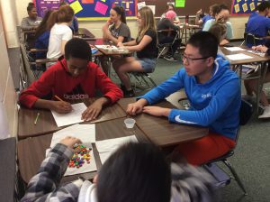 students using m&m's for math problems